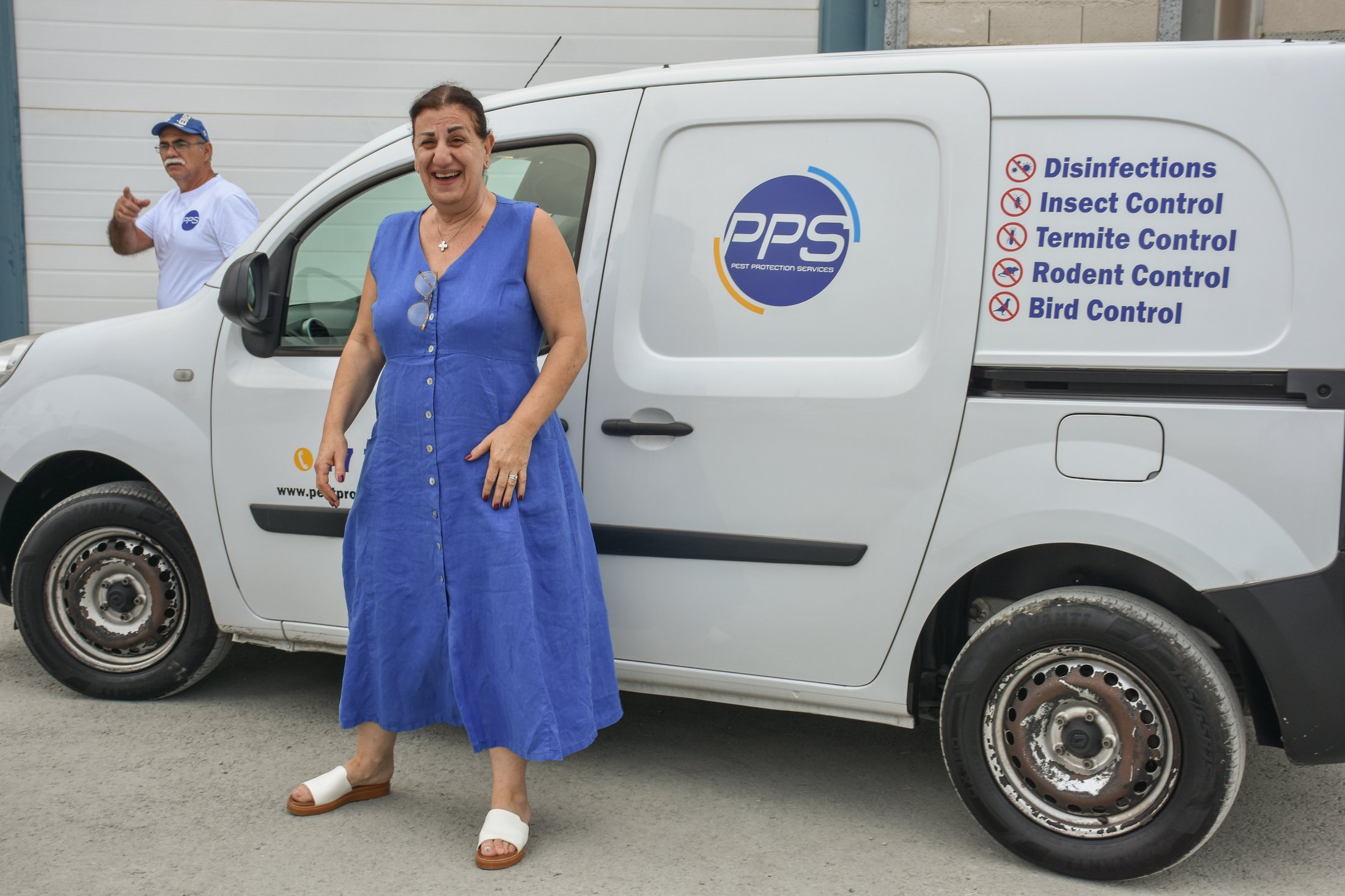 PPS Cyprus director beside a service vehicle